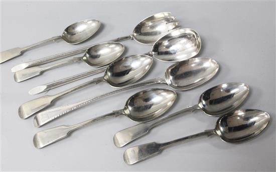 A pair of silver serving spoons, an 18th century silver basting spoon and six other spoons.